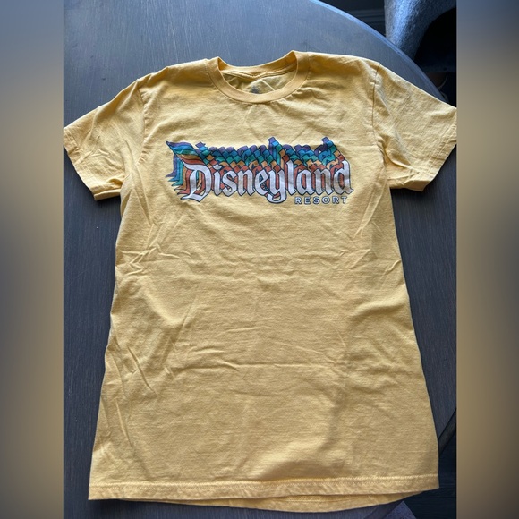 Disney Tops - DISNEY DISNEYLAND RESORT TEE T-SHIRT Sz S Yellow 3D RAINBOW LOGO